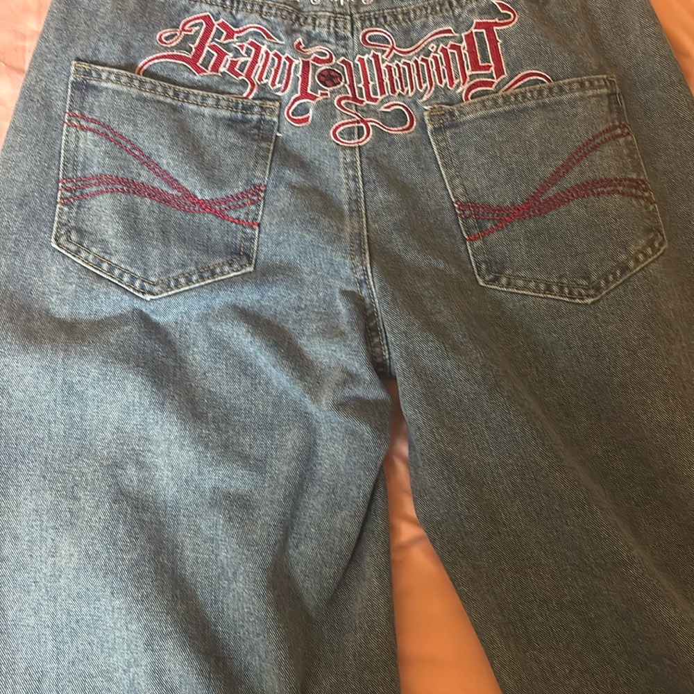 Embroidered Blue Jeans with Red Accents